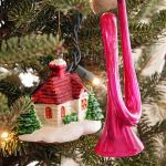 She fills her tree with family heirloom ornaments, and other decorations from her travels around the world.